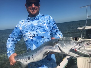 Barracuda fishing with surface plugs.