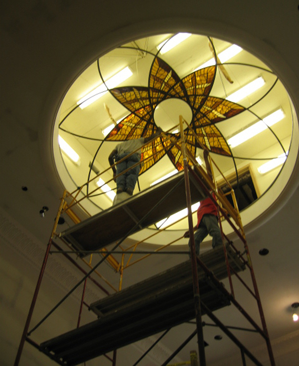 INSTALLATION PROCESS OF 12' DIAMETER STAINED GLASS DOME, NOTE THE LAYOUT OF THE LIGHT FIXTURES TO GIVE THE BEST LIGHT